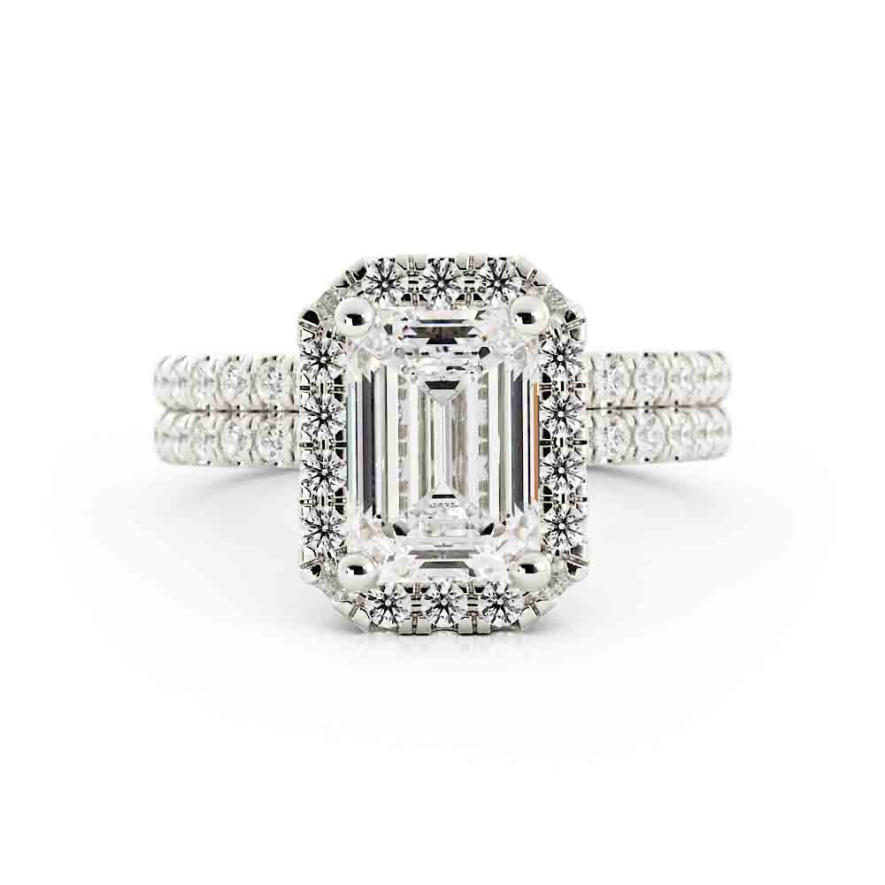 Emerald Cut Center with Halo and Rd Diamond Side stone