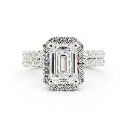 Emerald Cut Center with Halo and Rd Diamond Side stone