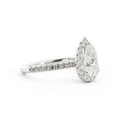 Pear Shaped Center With Halo Diamond Ring