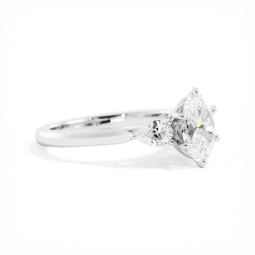 Three Stone Oval and Pear Shaped Diamond Ring