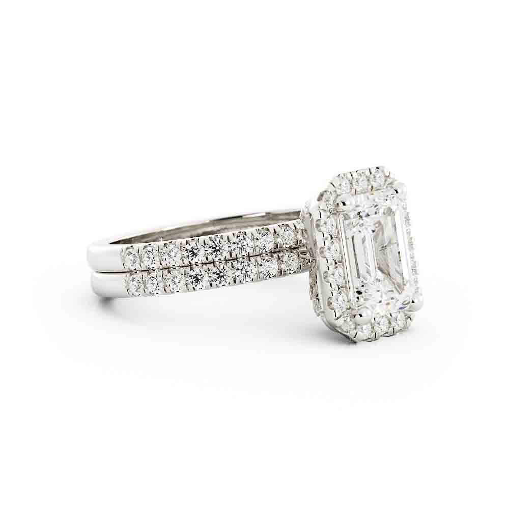 Emerald Cut Center with Halo and Rd Diamond Side stone