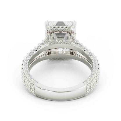 Split Shank Round Diamond Ring With Emerald Cut Center
