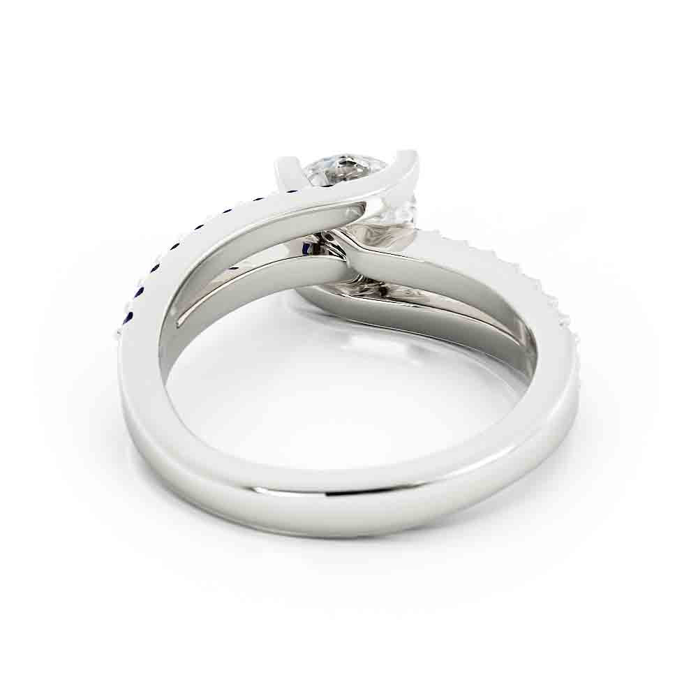 Sapphire and Blue Topaz Accent Stone with Diamond Center