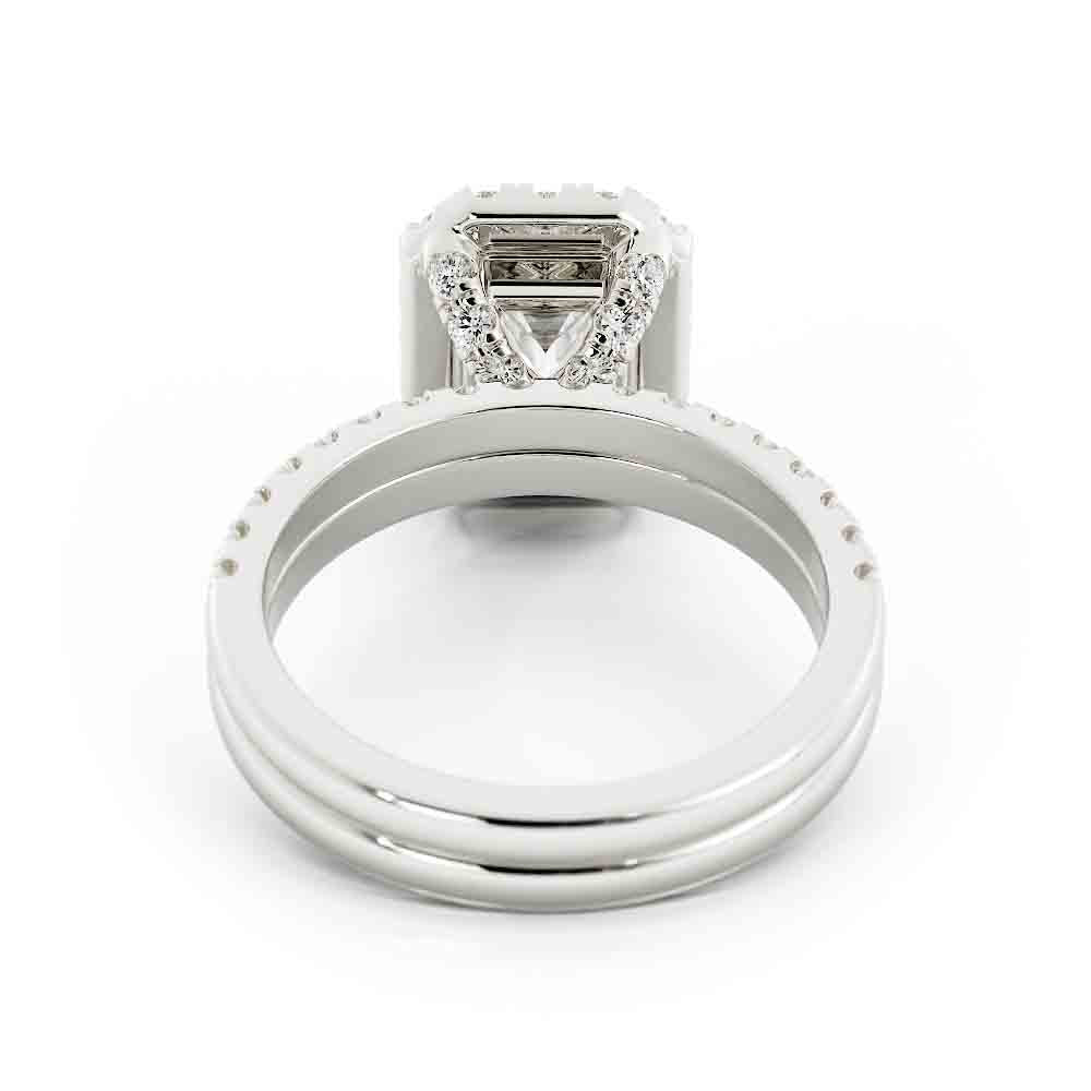 Emerald Cut Center with Halo and Rd Diamond Side stone