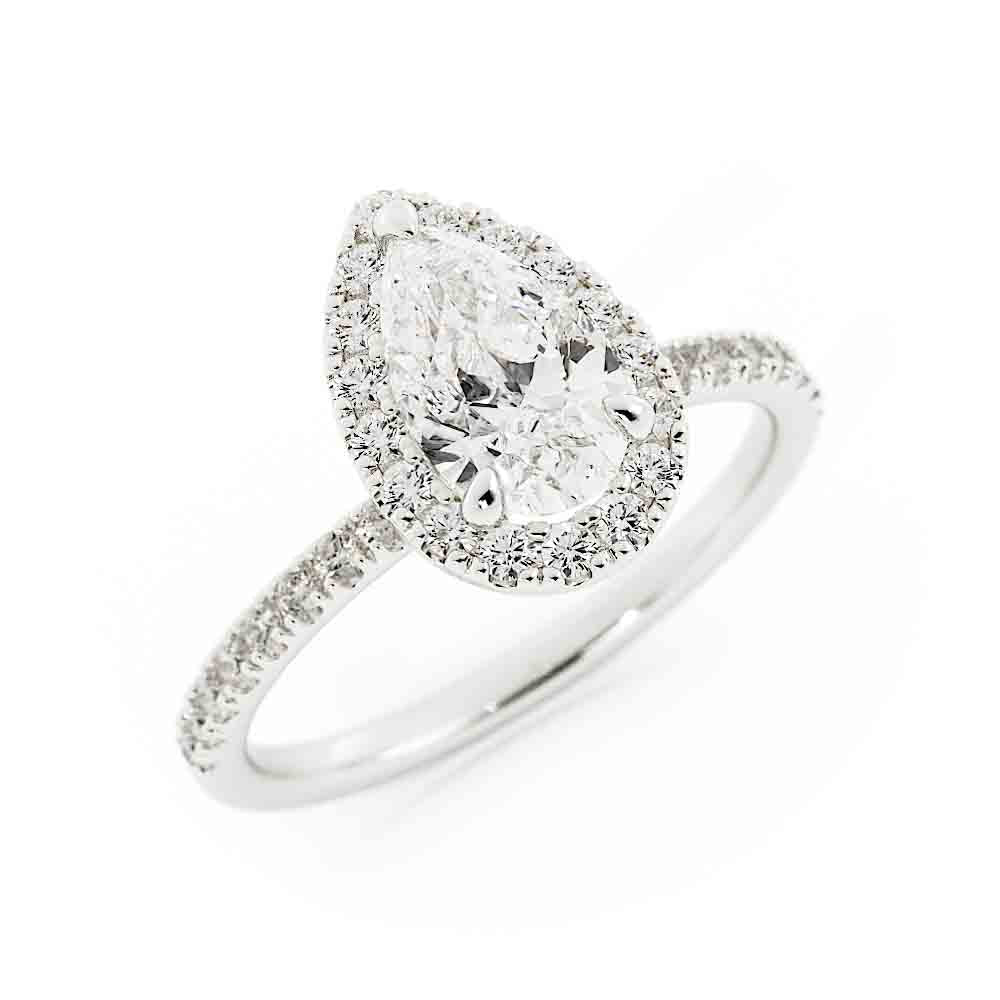 Pear Shaped Center With Halo Diamond Ring