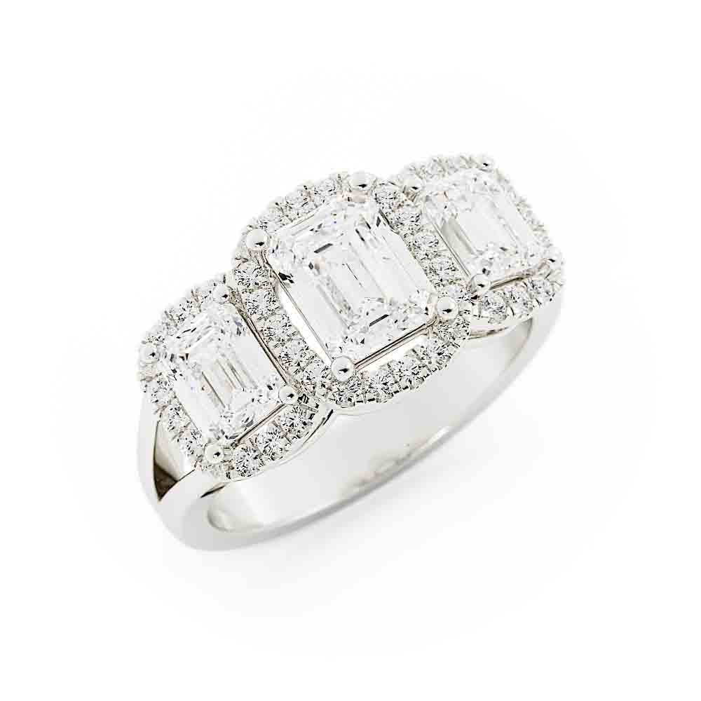 3 Emerald Cut Diamonds Surrounded By Cushion Shaped Diamond Halos