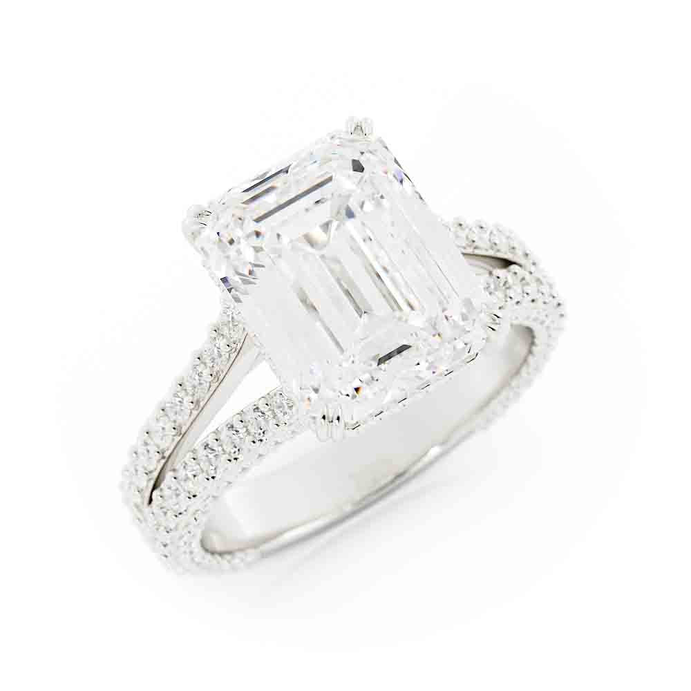 Split Shank Round Diamond Ring With Emerald Cut Center
