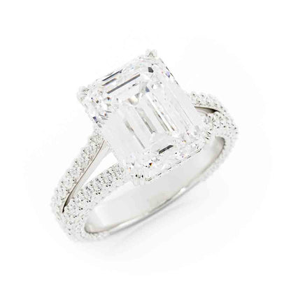 Split Shank Round Diamond Ring With Emerald Cut Center