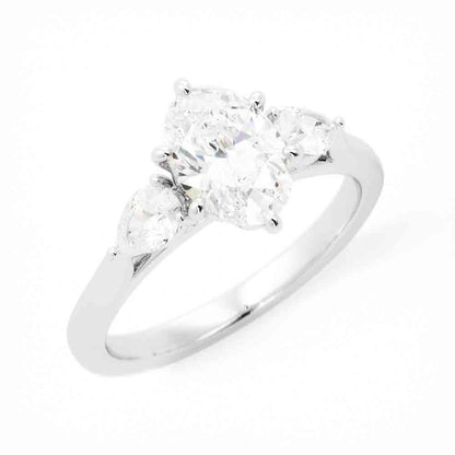 Three Stone Oval and Pear Shaped Diamond Ring