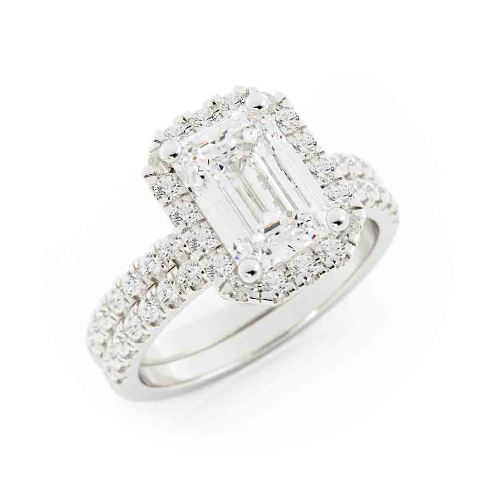 Emerald Cut Center with Halo and Rd Diamond Side stone
