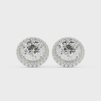 Video of diamond halo stud earrings on a white background